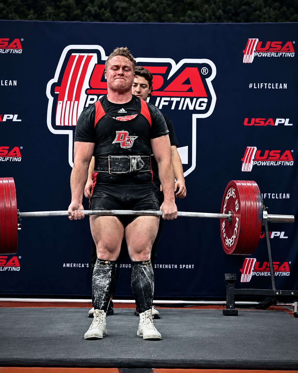Jacob Pickle mid-deadlift at a powerlifting meet